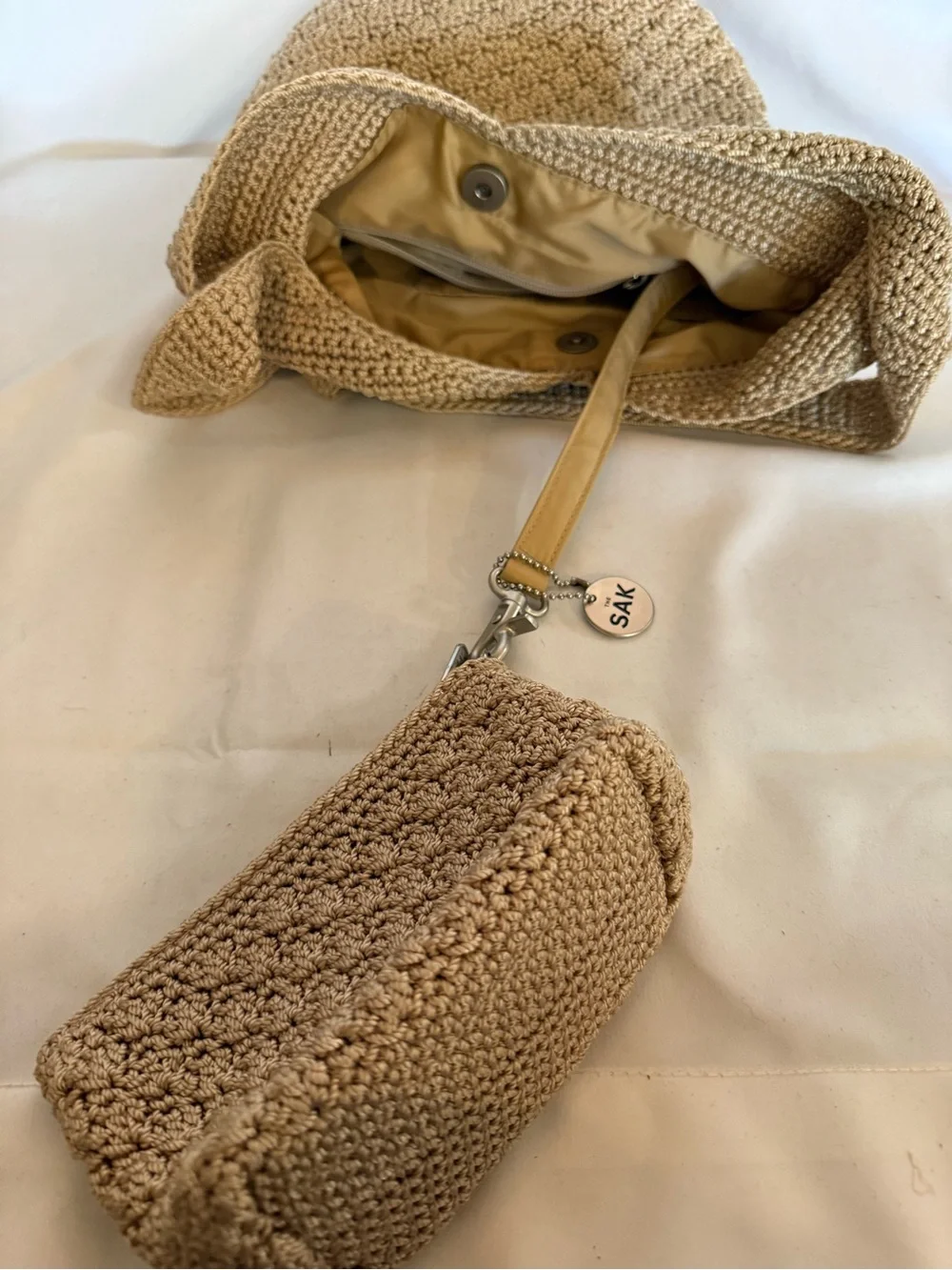 The Sak Beige Crochet Hobo Shoulder Bag with Matching Pouch
